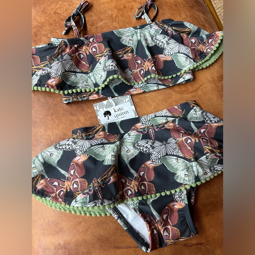 Kate Quinn Ruffle Pom Pom two piece moth pattern